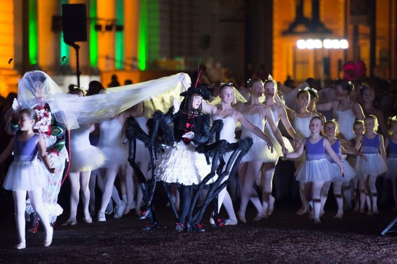 children dressed up and performing Roald Dahl's City of the Unexpected in Cardiff