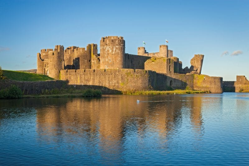Caerphilly Castle with the moat of water in the foreground