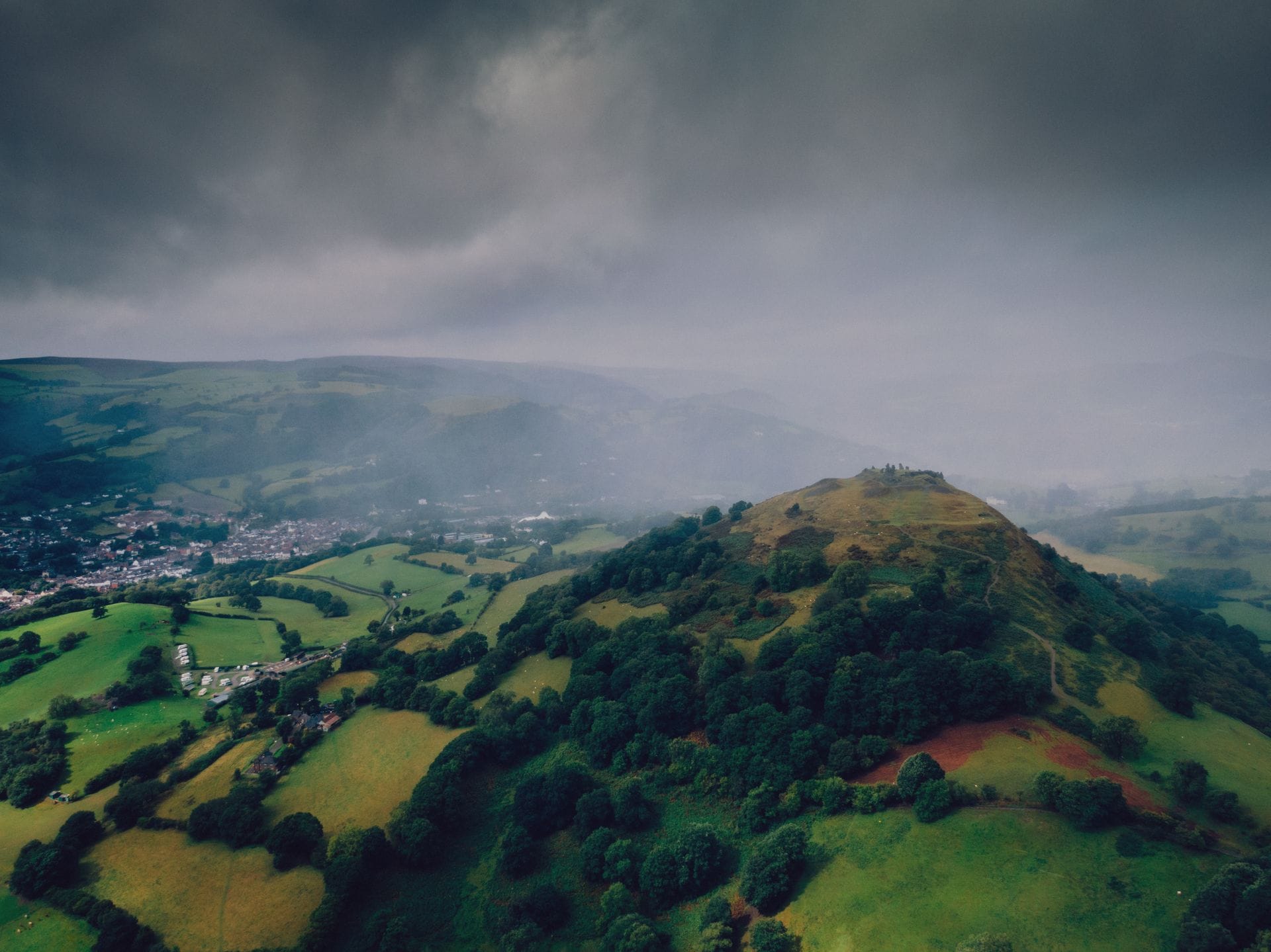 Hiking trail along the famous Offa's Dyke Path leading up towards the hilltop ruins of Castell Dinas Brân in Denbighshire, North Wales.