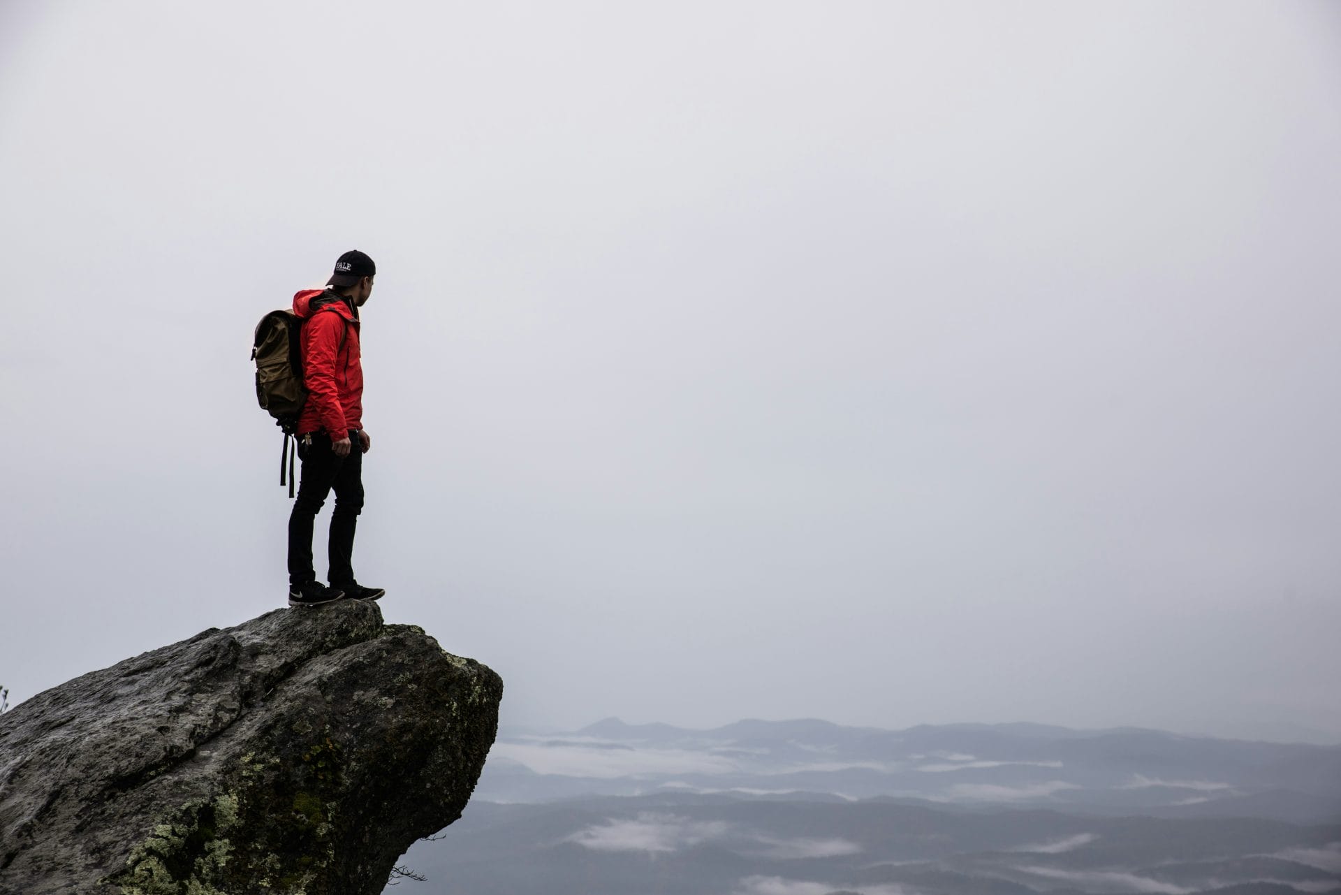 Hiker standing on a rock outcrop 