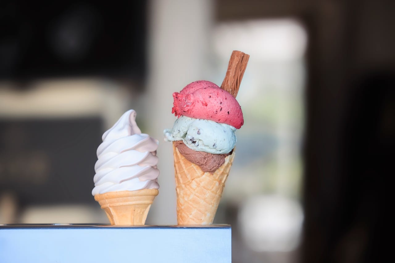 2 ice cream cones standing upright on a stand