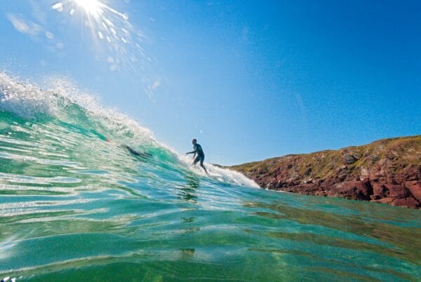 Surfer in water, Westdale Bay Pembrokeshire