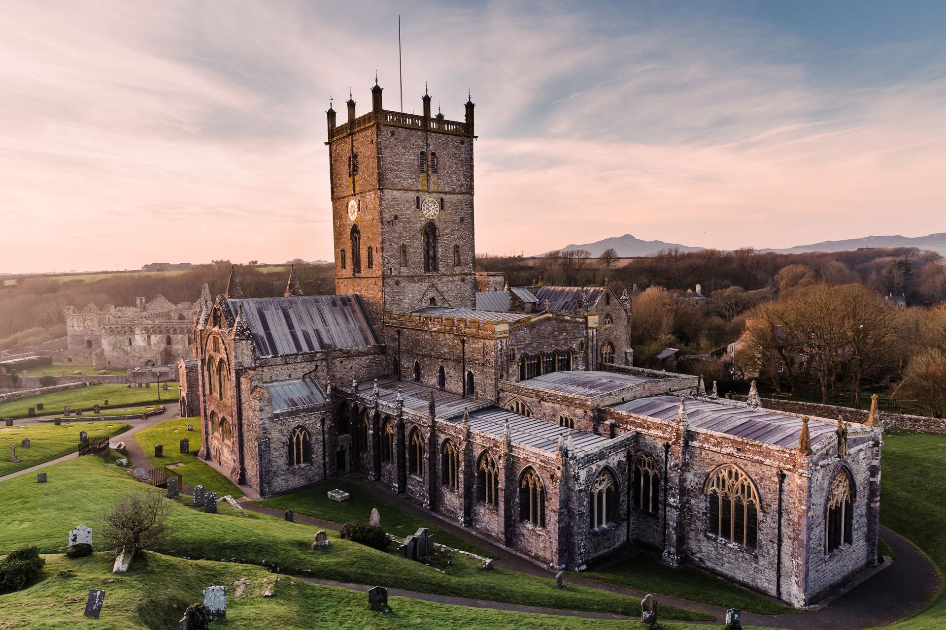 A spectacular architectural view of St Davids Cathedral crafted from local purple sandstone, beautifully situated within its historic, sheltered Pembrokeshire valley setting.