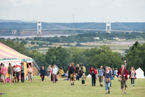 Picture people on a field at a festival