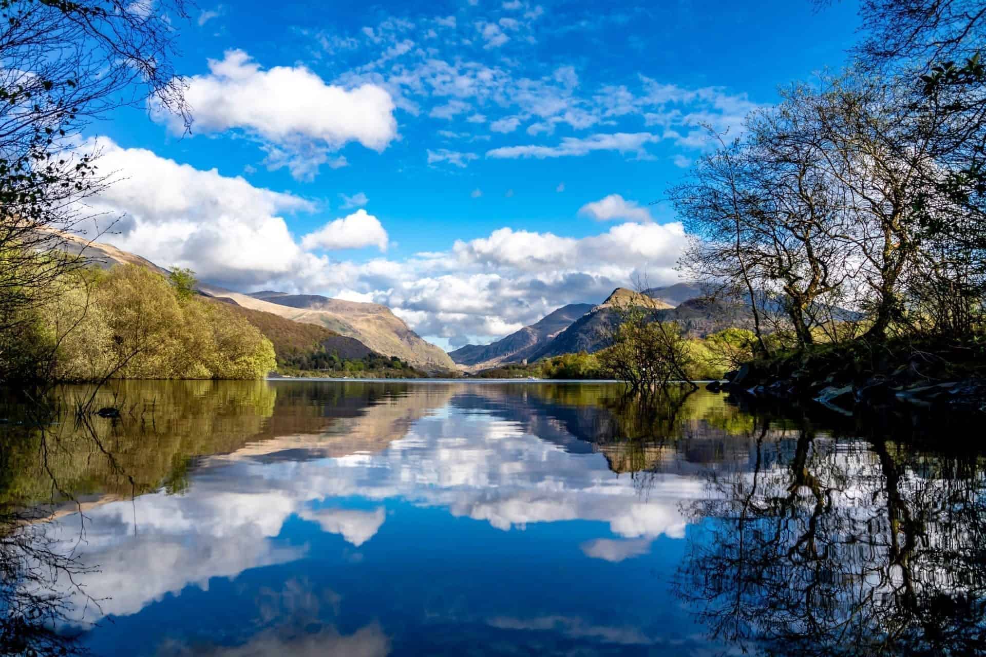 Reflections at Llyn Padarn with Dolbadarn Castle at Llanberis in Snowdonia National Park in background