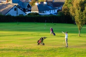 Men playing golf in Penmaenmawr